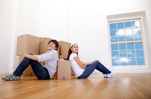 Careful loading of sofas and cabinets for a local move