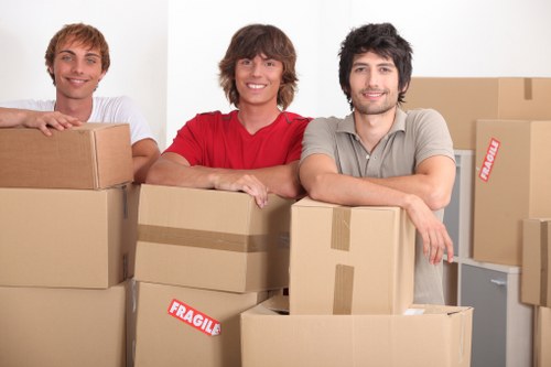 Local movers managing furniture loading in St Johns Wood